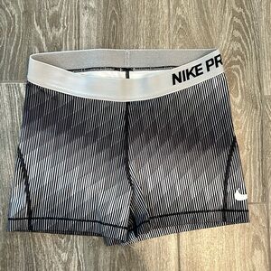 Grey and Black Nike Pros